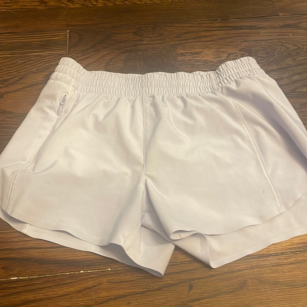 Girls size 12 athleta shorts  light purple in great condition